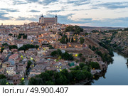 Toledo Cityscape with Alcazar at dusk in Madrid Spain. Стоковое фото, агентство Ingram Publishing / Фотобанк Лори