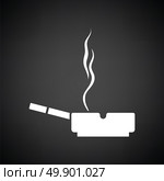 Cigarette in an ashtray icon. Black background with white. Vector illustration. Стоковая иллюстрация, агентство Ingram Publishing / Фотобанк Лори