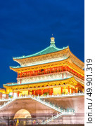 Xian bell tower (chonglou) in Xian ancient city of China at dusk. Стоковое фото, агентство Ingram Publishing / Фотобанк Лори