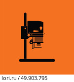 Icon of photo enlarger. Orange background with black. Vector illustration. Стоковая иллюстрация, агентство Ingram Publishing / Фотобанк Лори