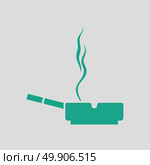 Cigarette in an ashtray icon. Gray background with green. Vector illustration. Стоковая иллюстрация, агентство Ingram Publishing / Фотобанк Лори