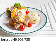 grilled beef skewer with fried rice. Стоковое фото, агентство Ingram Publishing / Фотобанк Лори