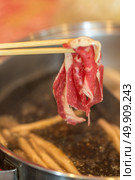 Wagyu Beef Premium for shabu and yakiniku with chopstocks. Стоковое фото, агентство Ingram Publishing / Фотобанк Лори