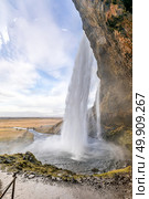 Seljalandsfoss waterfall on the South of Iceland. Стоковое фото, агентство Ingram Publishing / Фотобанк Лори
