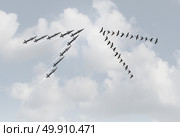 War peace concept as a group of peaceful geese in a v formation facing dangerous missiles as a metaphor for violence versus pacifism or diplomacy with 3D illustration elements. Стоковое фото, агентство Ingram Publishing / Фотобанк Лори