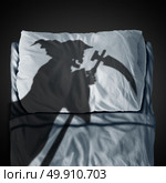 Death bed and fear of mortality concept as a grim reaper ghost casting a shadow on a pillow and sleep mattress as a medical and health fatality symbol in a 3D illustration style. Стоковое фото, агентство Ingram Publishing / Фотобанк Лори