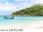 Tropical beach, traditional long tail boats, Andaman Sea, Thailand. Стоковое фото, агентство Ingram Publishing / Фотобанк Лори