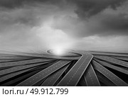 Centralization concept and center of business focus metaphor as a group of twisted paths connecting together as a 3D illustration. Стоковое фото, агентство Ingram Publishing / Фотобанк Лори