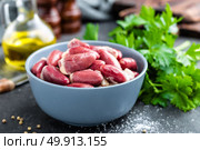 raw chicken hearts. Стоковое фото, агентство Ingram Publishing / Фотобанк Лори