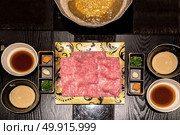matsusaka beef A5 Wagyu Beef Shabu shabu Set with steam, Groumet Japanese hot pot cuisine. Стоковое фото, агентство Ingram Publishing / Фотобанк Лори