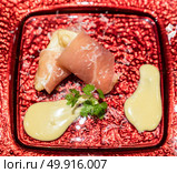 Arranged small ball : Deep fried  European pear tempura with Prosciutto parma ham. Стоковое фото, агентство Ingram Publishing / Фотобанк Лори