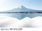 Mt. Fuji mountain with snow ladscape. Стоковое фото, агентство Ingram Publishing / Фотобанк Лори