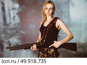 Portrait of attractive woman in military style. Стоковое фото, агентство Ingram Publishing / Фотобанк Лори