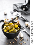 Pickled cucumbers, small marinated pickles, gherkins. Стоковое фото, агентство Ingram Publishing / Фотобанк Лори