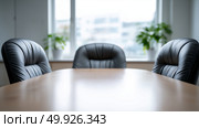 Meeting room setup with leather chairs, plants, and a wooden table. Стоковое AI-изображение, AI-художник Katsiaryna Repich / Фотобанк Лори