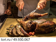 Carving of Roasted lamb meat. Стоковое фото, агентство Ingram Publishing / Фотобанк Лори
