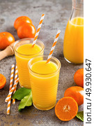 Mandarin orange juice. Refreshing summer drink. Fruit refreshment beverage. Стоковое фото, агентство Ingram Publishing / Фотобанк Лори