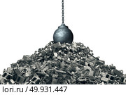 Knocking down and infrastructure makeover concept as a wrecking ball on debris from a destroyed structure as a renewal and renovation symbol with 3D illustration elements. Стоковое фото, агентство Ingram Publishing / Фотобанк Лори