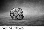 Sands of time and abstract aging idea as a head made od old clocks shaped as a human head in a barren desert with 3D illustration elements. Стоковое фото, агентство Ingram Publishing / Фотобанк Лори