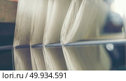 old weaving loom - closeup - photo, vintage filter image. Стоковое фото, агентство Ingram Publishing / Фотобанк Лори