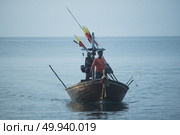 Thailand November 25 2015,fisherman and boat driver between going out to Thailand gulf for fishing in Leam-Singha ,Chantaburi town Thailand. Редакционное фото, агентство Ingram Publishing / Фотобанк Лори