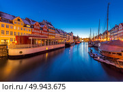 Copenhagen Nyhavn, New port of Copenhagen, at night in Denmark. Стоковое фото, агентство Ingram Publishing / Фотобанк Лори