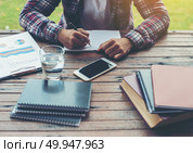 Hipster Businessman Working writing Determine Workspace Lifestyl. Hipster Businessman Working writing Determine Workspace Lifestyle Concept. Стоковое фото, агентство Ingram Publishing / Фотобанк Лори