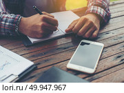 Hipster Businessman Working writing Determine Workspace Lifestyl. Hipster Businessman Working writing Determine Workspace Lifestyle Concept. Стоковое фото, агентство Ingram Publishing / Фотобанк Лори