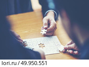 Finally finding solution concept with jigsaw. Стоковое фото, агентство Ingram Publishing / Фотобанк Лори