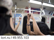 Handle bars in train. Стоковое фото, агентство Ingram Publishing / Фотобанк Лори