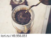 coffee drip process, vintage filter image, slow bar. Стоковое фото, агентство Ingram Publishing / Фотобанк Лори