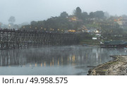 Wooden bridge - Kanchanaburi - Thailand,2016 - The wooden bridge was built across Songaria rivervby local villager to connect between Thai and Mohn people. The old one was vanished by big flood. Стоковое фото, агентство Ingram Publishing / Фотобанк Лори