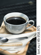 Coffee cup and saucer on old wooden table. Стоковое фото, агентство Ingram Publishing / Фотобанк Лори