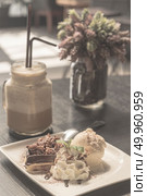 Ice coffee later with cake, filtered vintage. Стоковое фото, агентство Ingram Publishing / Фотобанк Лори