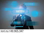 Businessman with success word marketing concept. Business hi tec. Businessman with success word marketing concept. Business hi technology concept. Стоковое фото, агентство Ingram Publishing / Фотобанк Лори