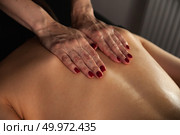Relaxation and Rejuvenation Through Therapeutic Massage in a Serene Medical Setting. Стоковое фото, фотограф Aleksandr Golubev / Фотобанк Лори