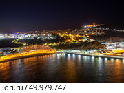 Picturesque night view of Al Hoceima city and modern hotel buildings on the shore of the Mediterranean Sea bay. Стоковое фото, фотограф Евгений Ткачёв / Фотобанк Лори