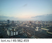 Kiev, Ukraine.- January 11,2018: View from a birdseye on the city of Kiev and the railway with trains. Aerial view of the city of Kiev. Редакционное фото, агентство Ingram Publishing / Фотобанк Лори