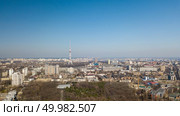 Panorama of the city of Kiev with a park, TV tower and sleeping area Dorogozhichi from a bird’s eye view Kiev, Ukraine. Drone photo. Panoramic view of the city of Kiev with Dorogozhychi distric with a TV tower, Ukraine, aerial view. Стоковое фото, агентство Ingram Publishing / Фотобанк Лори