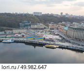 Aerial view of River Port, Podil and Postal Square in Kiev the capital of Ukraine. Podil is one of the oldest neighborhoods of Kiev. Drone photo. view of Podil, River station and the river Dnieper in Kyiv, Ukraine. Стоковое фото, агентство Ingram Publishing / Фотобанк Лори