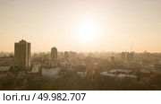 Skyline bird eye aerial view of the city center with an art college and a television tower under dramatic sunset sky in Kiev, Ukraine. Drone photo. Skyline bird eye aerial view of the city Kyiv center on beautiful sunset, Ukraine. Стоковое фото, агентство Ingram Publishing / Фотобанк Лори