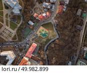 Aerial top view of Saint Andrew’s church and Andreevska street from above in Kiev city, Ukraine. Drone photo. Aerial top view of Saint Andrew’s church from above in Kiev city. Стоковое фото, агентство Ingram Publishing / Фотобанк Лори