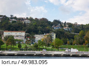 The cityscape with ancient and modern buildings in Istanbul Turkey from the Bosphorus strait on a sunny day with background cloudy sky. Landscape panoramic view from the sea to the historical part of Istanbul, Turkey. Стоковое фото, агентство Ingram Publishing / Фотобанк Лори