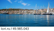 Beautiful sea views with boats, yachts and Palma de Mallorca on the horizon, Majorca, Balearic Islands, Spain. boats in clear blue water of bright summer day. Стоковое фото, агентство Ingram Publishing / Фотобанк Лори