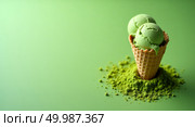 Artistic highresolution photograph of a matcha ice cream cone on a textured green background. Стоковое AI-изображение, AI-художник Андрей Бакусов / Фотобанк Лори