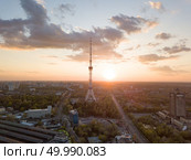 view of the city of Kiev with Dorogozhychi distric with a TV tower on sunset, Ukraine. Drone photo. view of the city with a TV tower in Kiev on a beautiful sunset. Стоковое фото, агентство Ingram Publishing / Фотобанк Лори