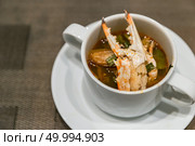 Thai Crab tom yum spicy chowder soup. Стоковое фото, агентство Ingram Publishing / Фотобанк Лори