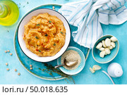 Hummus with chickpea and tahini, delicious and healthy protein vegan and vegetarian food, top view, flat lay. Стоковое фото, агентство Ingram Publishing / Фотобанк Лори