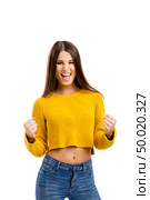 Beautiful and happy woman, isolated over white background . Стоковое фото, агентство Ingram Publishing / Фотобанк Лори