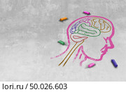 Idea of autism and autistic development disorder as a symbol of a communication and social behavior psychology as a chalk drawing on asphalt in a 3D illustration style. Стоковое фото, агентство Ingram Publishing / Фотобанк Лори